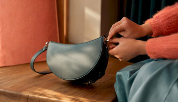 Close-up of bamboo-detail on structured handbag
