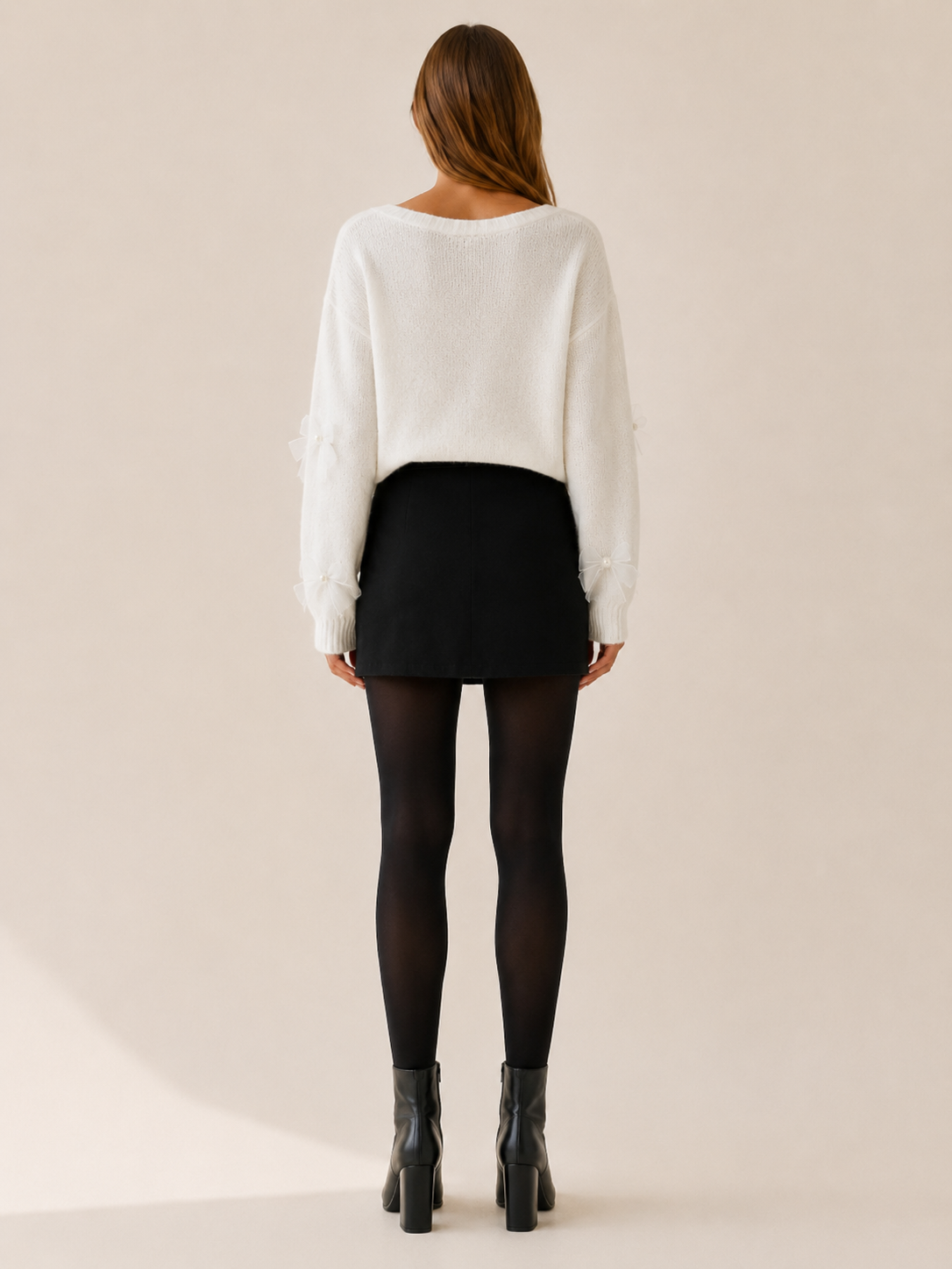 Myravine | V Neck Sweater with Bow Detail
