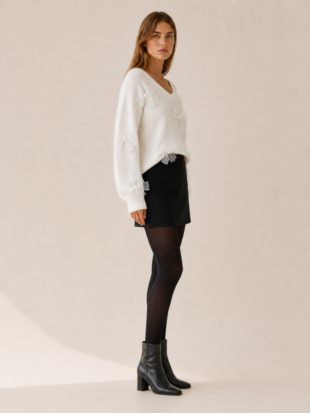 Myravine | V Neck Sweater with Bow Detail